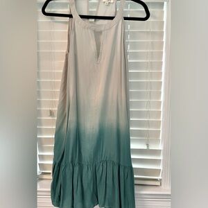 Super cute Umgee women’s sundress size L. Peep holes front and back. Above knee